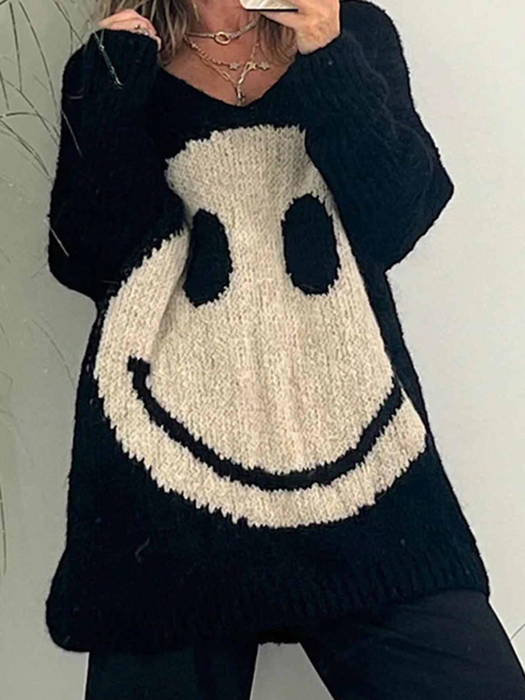 Laura® | Long-sleeved sweater with a smiling face and a V-neck