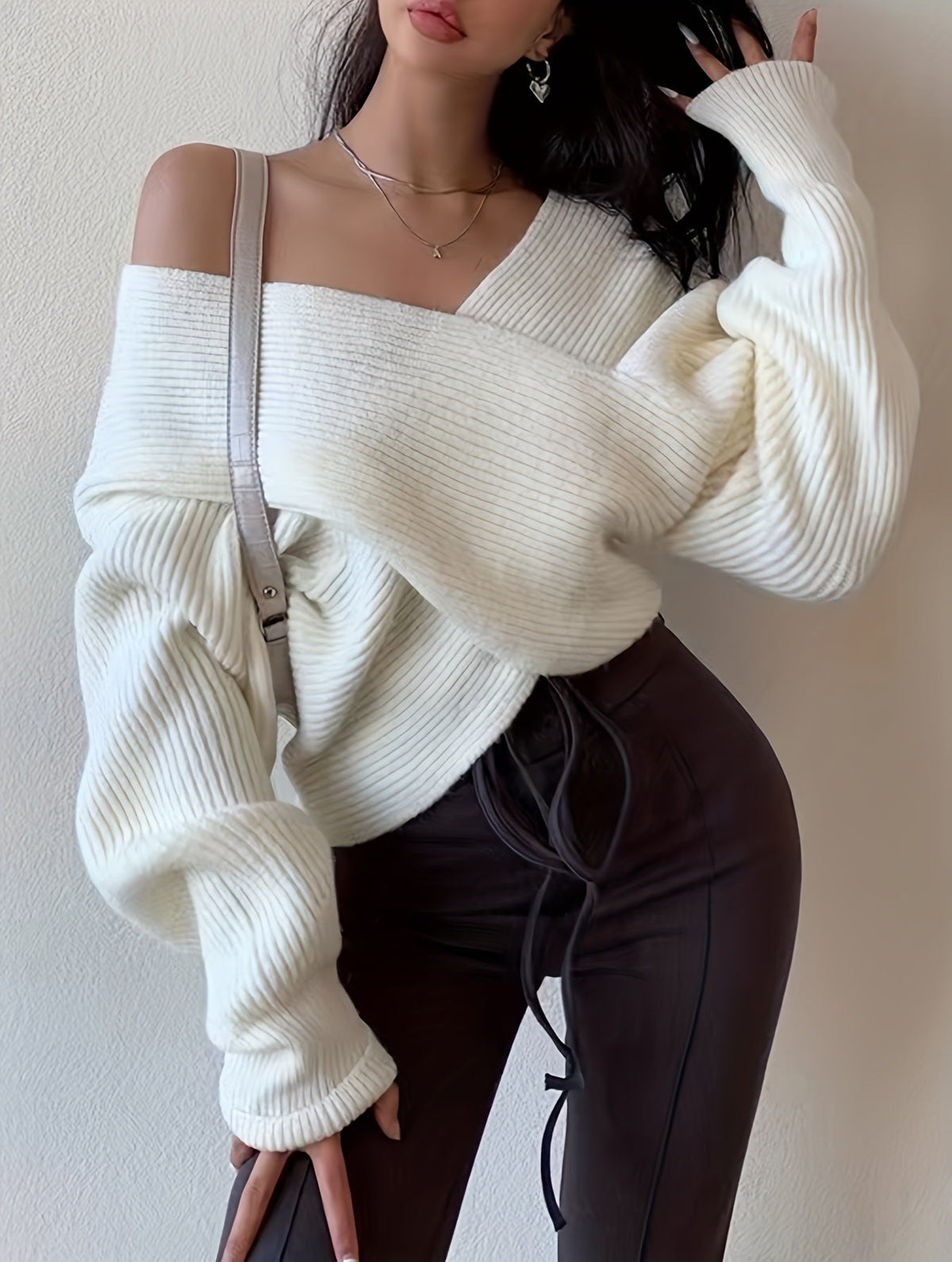 Elda® | Solid knit sweater with a wrap front
